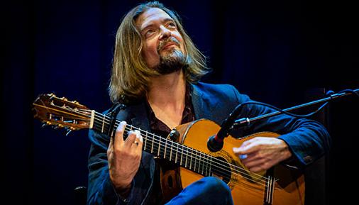 Juanito Pascual playing his guitar